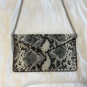 Snakeskin studded clutch crossbody